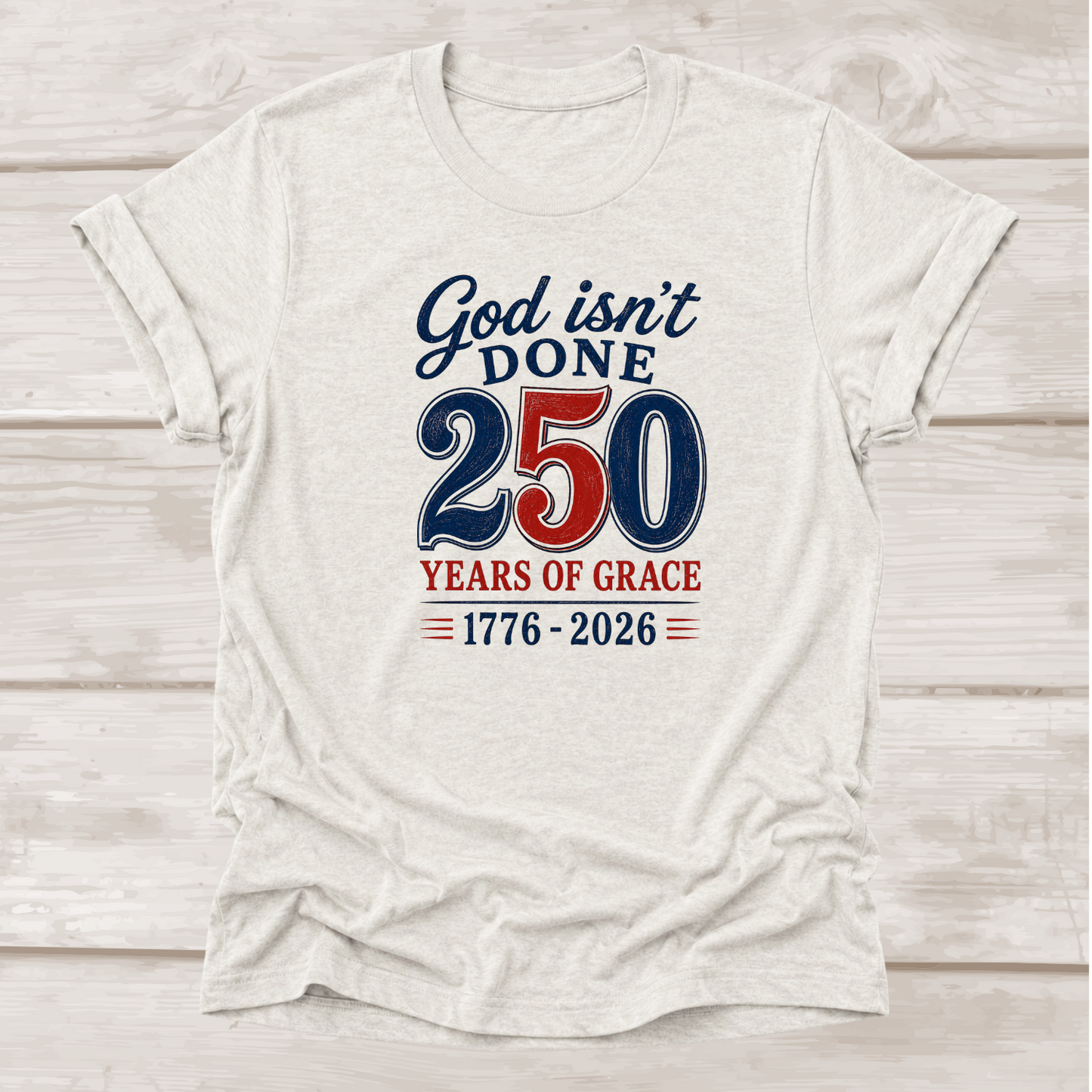 God Isn't Done 250 Years of Grace 1776-2026 Christian T-Shirt in Heather Cement | BEE Grace-full