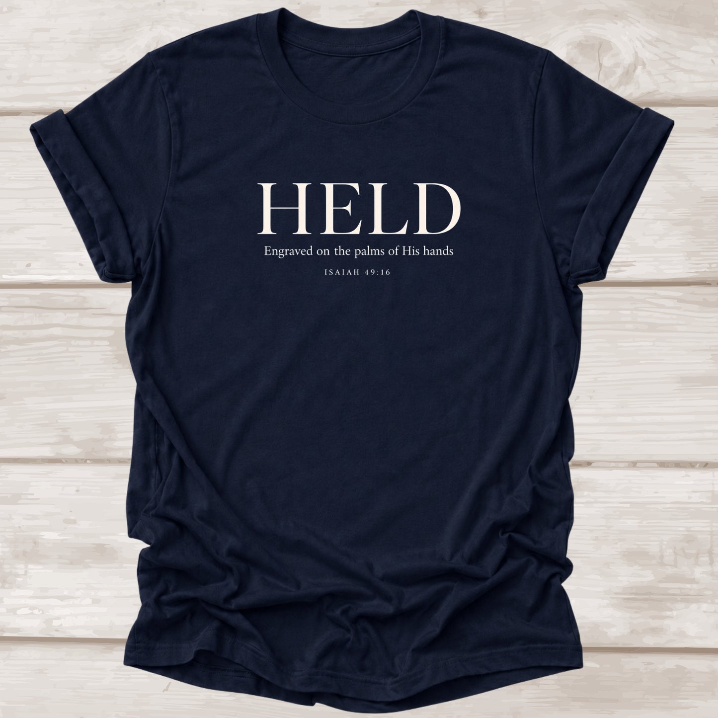 Held Isaiah 49:16 faith apparel t-shirt in navy – BEE Grace-full